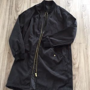 Long black tench coat